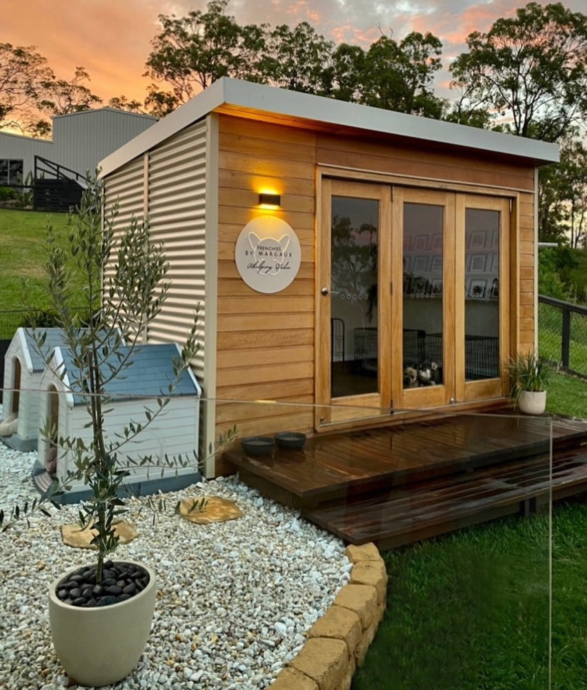 "The Hideout" backyard pod, 3830mm x 2490mm, 9.5m2, with bifold doors, western red cedar on the front of the building, and colorbond on the side and back walls. A stylish and functional option for a garden studio, she shed, backyard pod, or backyard office.