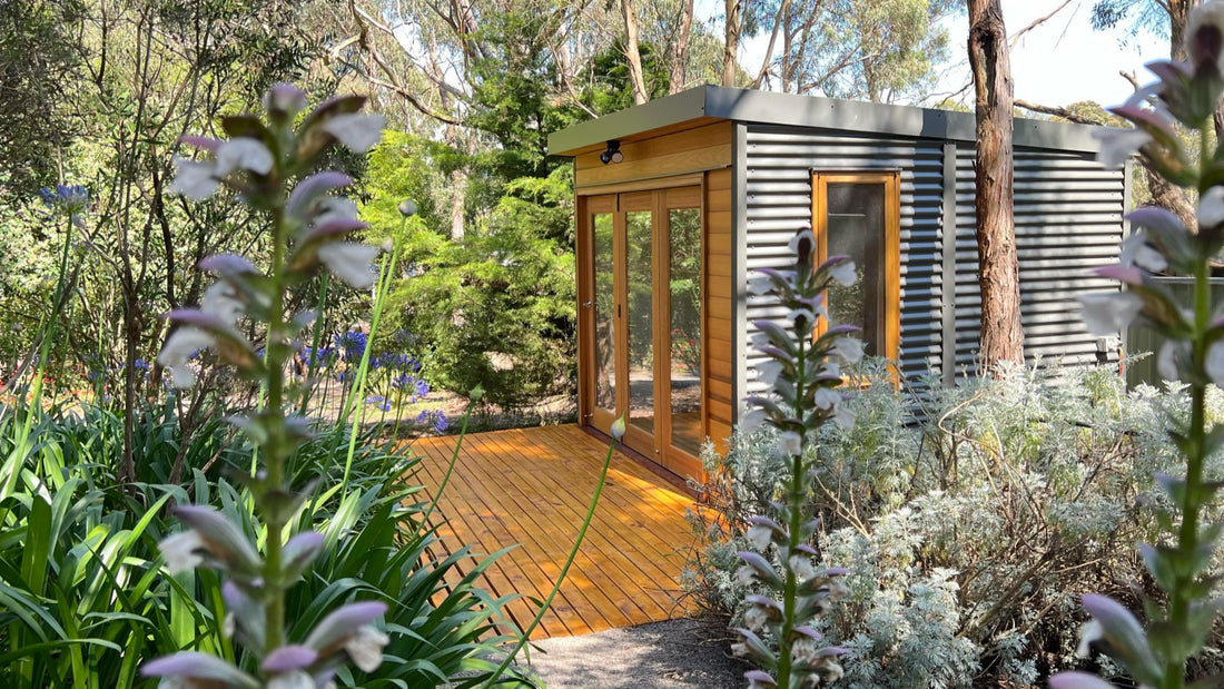 The Hideaway garden studio by Designer Hideaways — a compact, prefab outdoor building with cedar and Colorbond cladding, perfect for use as a backyard office, creative studio, hobby room, or work-from-home pod.