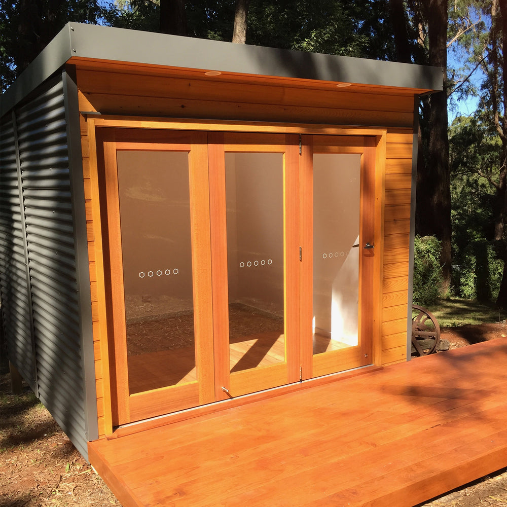 Hideaway Garden Pod with deck ready to be used for home gym, backyard studio